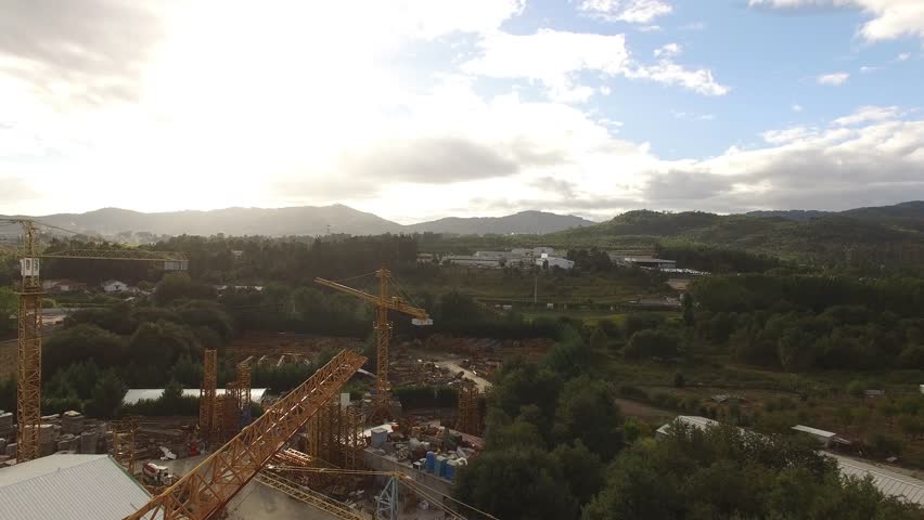 Flying Over Cranes in warehouse