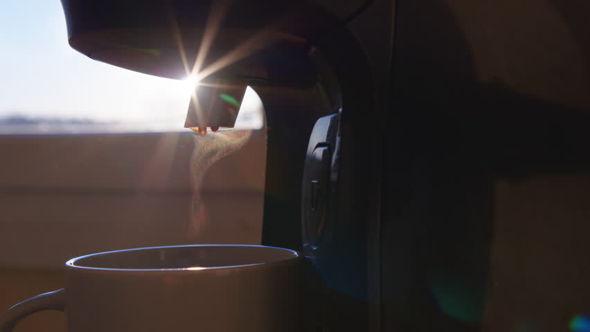 Coffee machine filling a cup with. Making coffee into cup, espresso coming out from an automatic coffee maker machine. Beverage drink for breakfast Royalty-Free Stock Footage #1100835705