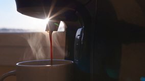 Coffee machine filling a cup with. Making coffee into cup, espresso coming out from an automatic coffee maker machine. Beverage drink for breakfast - Powered by Shutterstock - Get 15% off with code: PIKWIZARD15