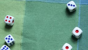 Small game dice being thrown on a table forming an abstract blank empty slide background frame, copy space in the middle. Math, random numbers, randomness, education, statistics abstract concept - Powered by Shutterstock - Get 15% off with code: PIKWIZARD15