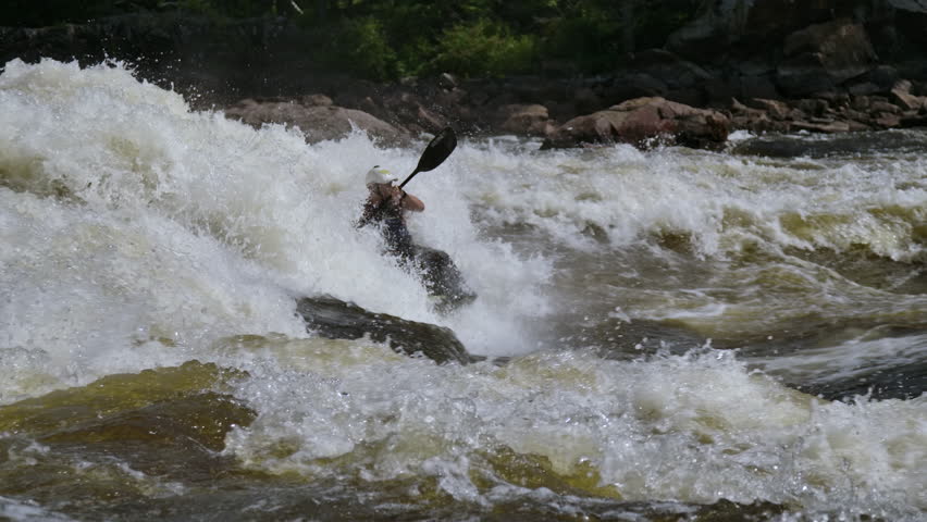 Extreme sports flip kayak white water waves