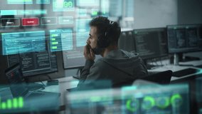 Software Programmer Working on Computer, Engineering Neural Networking, Machine Learning, Big Data, Artificial Intelligence. Animated Coding Language Projection Overlayes the Screen. Back View Shot - Powered by Shutterstock - Get 15% off with code: PIKWIZARD15