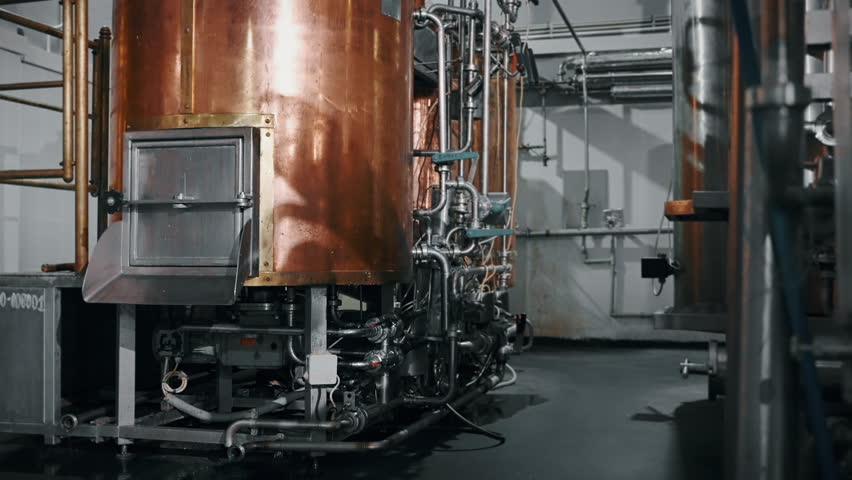 copper tank for mashing wort in brewery, brewing process in craft beer plant, traditional technology of brewing lager or ale beers