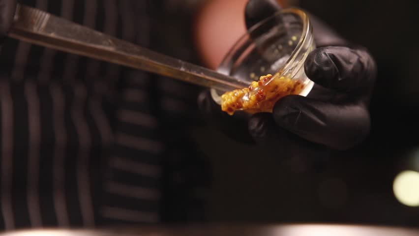 the chef prepares food in the kitchen
