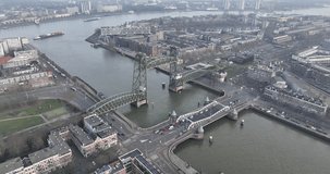Stunning aerial footage of the Koninginnebrug in Rotterdam, capturing the hustle and bustle of the city's daily life.