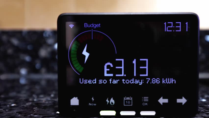 Time lapse of a home electricity smart meter representing the increasing cost of energy consumption during the cost of living crisis. Zoom in. Royalty-Free Stock Footage #1100843697