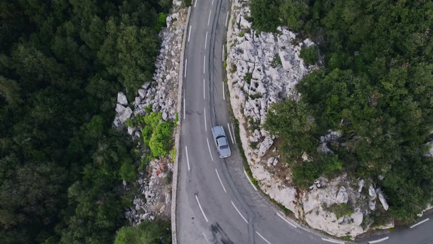 Old vintage car driving in the French mountains outside Monaco. Royalty-Free Stock Footage #1100844189