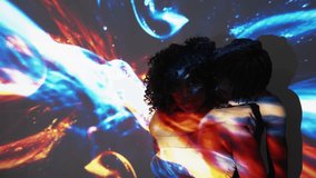  love. Beloved couple. Tranquil people. Tender black man hugging and kissing woman posing on double exposure golden blue space lights flow overlay background copy space. - Powered by Shutterstock - Get 15% off with code: PIKWIZARD15