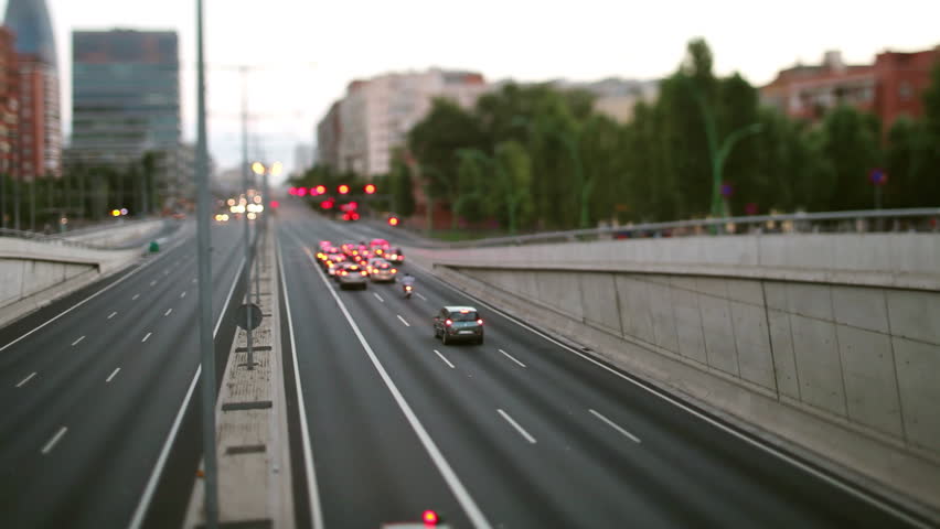 A timelapse view of a busy underpass in barcelona with a rush of vehicle lights | Shutterstock HD Video #1100853505