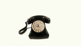 A stop motion shot of a classic rotary telephone with the handset jumping up and down - Powered by Shutterstock - Get 15% off with code: PIKWIZARD15
