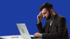 Tired business man overworked migraine headache working laptop desk isolated blue screen chroma key. Unwell male workaholic employee manager boss suffering head pain ache stress at office workplace - Powered by Shutterstock - Get 15% off with code: PIKWIZARD15