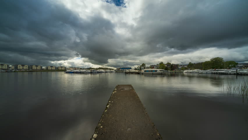 Timelapse of Carrick on Shannon town in county Leitrim and Roscommon with moving clouds on river Shannon in Ireland.