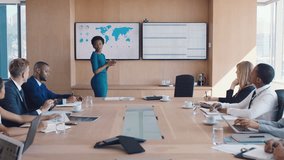 Black woman, business leader and presentation in office boardroom for meeting collaboration, training and digital marketing report planning. Leadership, ceo african woman and corporate conference - Powered by Shutterstock - Get 15% off with code: PIKWIZARD15