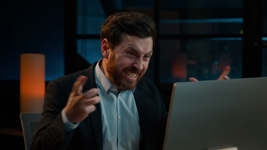 Annoyed angry businessman Caucasian middle-aged 40s man CEO employee mad furious crazy shouting fail online business project on computer trouble failure problem stress evening night office background Royalty-Free Stock Footage #1100866823