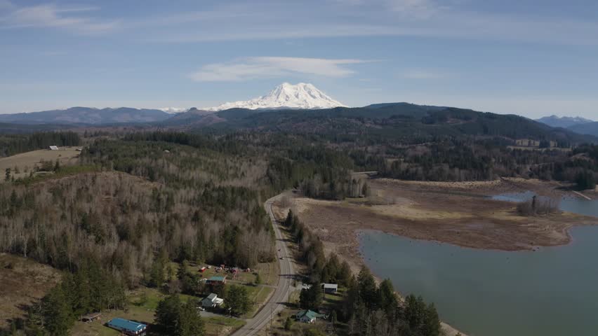 Panoramic view of Mount Rainier with surrounding valley landscape near Ashford Washington by Alder Lake - 4K Drone