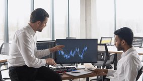 Indian and caucasian traders celebrating successful day at the stock market. Bitcoin growth, bullrun - Powered by Shutterstock - Get 15% off with code: PIKWIZARD15