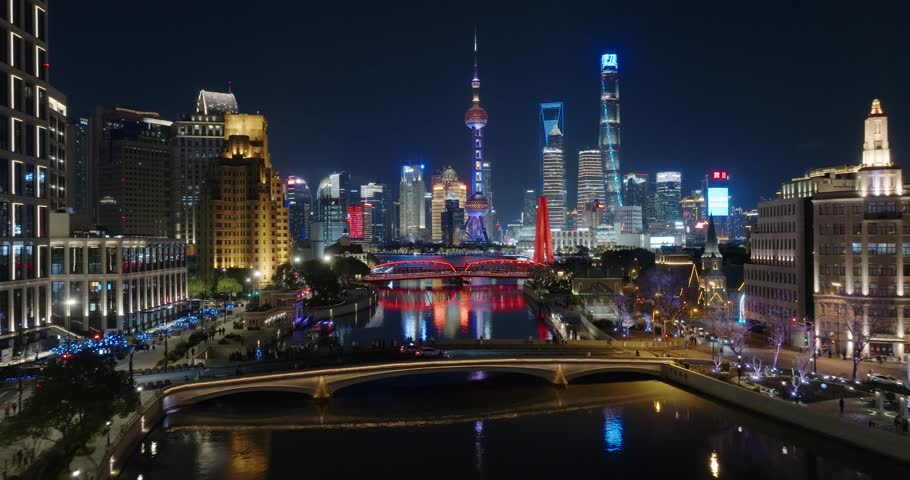 Shanghai Skyline at Night. Urban Lujiazui District, Huangpu River and Waibaidu Bridge. China. Drone footage. Royalty-Free Stock Footage #1100871979