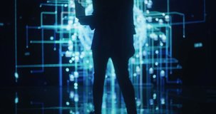 Back View of a Woman Holding Laptop Computer, Walking Towards a Big Digital Screen and Interacting with AI Neural Network 3D Animation. Professional Female Manager Analysing Information in Big Data - Powered by Shutterstock - Get 15% off with code: PIKWIZARD15