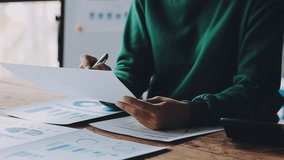 Financial Businesswomen analyze the graph of the company's performance to create profits and growth, Market research reports and income statistics, Financial and Accounting concept. - Powered by Shutterstock - Get 15% off with code: PIKWIZARD15