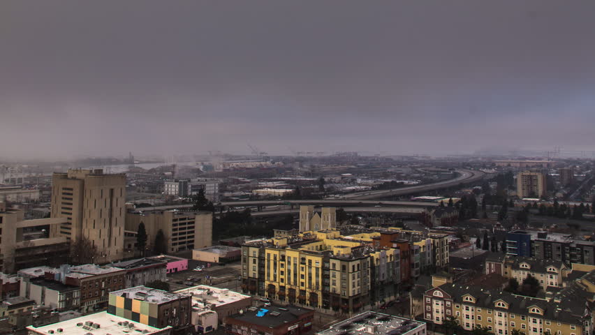 Foggy, misty morning over a San Francisco neighborhood - time lapse