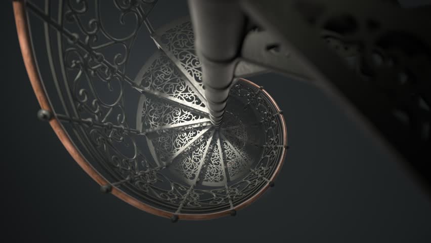 Beautiful black steel spiral staircase with ornamented steps. The camera moves upwards. Piece of vintage decorated architecture construction. Seamless, endless looping animation.