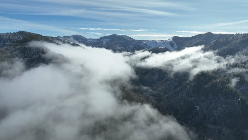 Clouds drift across the scenic coastal range of northern Oregon between Tillamook and Portland. The Coast Range is a series of mountain ranges along the Pacific coast, from Baja California to Alaska.