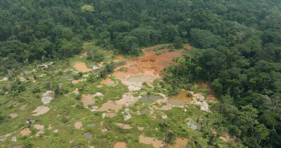 Aerial.Deforestation.Climate change.Illegal artisanal gold mining in a tropical rain forest Royalty-Free Stock Footage #1100910595