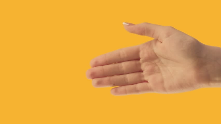 Vertical video. Goodbye gesture. Farewell sign. See you later. Female hand waving bye isolated on orange copy space background. Royalty-Free Stock Footage #1100914357