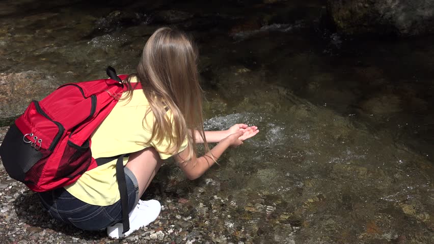 Kid Washing Hands in River Water, Child Playing in Spring Waterfall, Tourist Girl Hiking at Camping in Mountains, Trip, Excursion