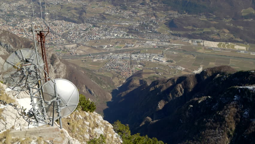 Skiing and snowboarding in the Italian Alps. Beautiful winter view on the city of Trento and the Adige valley from the Monte Bondone mountain, northern Italy