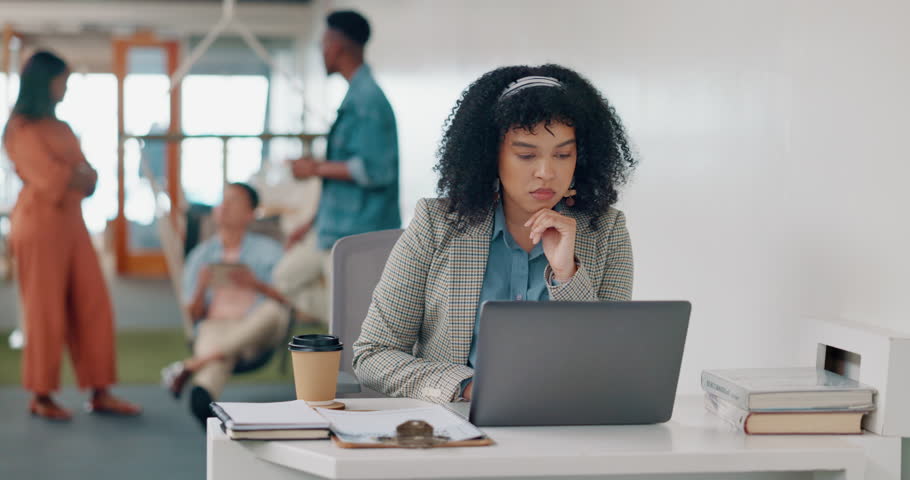Thinking, laptop or black woman working on a digital marketing seo strategy for an advertising or digital agency. Typing, research or social media page editor copywriting an internet article or blog | Shutterstock HD Video #1100928839