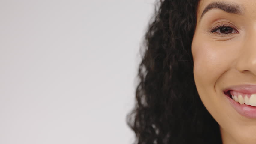 Portrait, happy and mockup with a black woman in studio on gray background space for product branding. Face, smile and half with an attractive young female on mock up from marketing or advertising | Shutterstock HD Video #1100929943