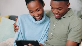 A couple streaming a movie, on the phone and in their home, having fun and laughing. Young, black and loving couple using smartphone to watch movies and videos. Laugh, love and spending time together