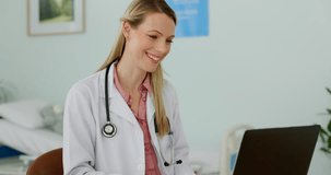 Doctor, woman and laptop for video call, hospital and communication on mobile internet in office. Happy medic, computer or virtual consultation on web, app or telehealth with smile on tech in clinic