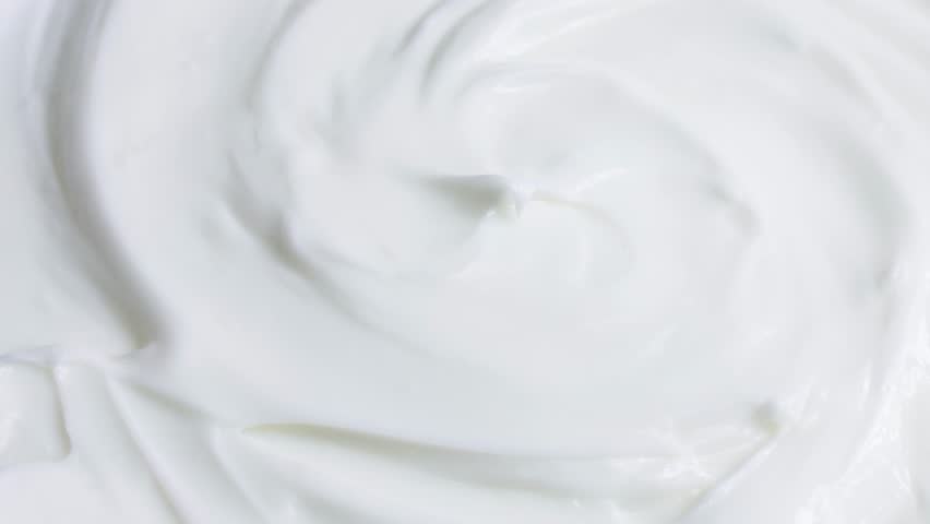 White smooth creamy moisturizing face cream texture rotation close up | Shutterstock HD Video #1100933031