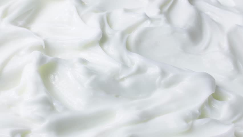 White smooth creamy moisturizing face cream texture rotation close up | Shutterstock HD Video #1100933033