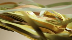 3D render motion animation digital backdrop for business presentation yellow soft silk ribbons waving on beige background fabric textile fluttering cloth wavy cut torn leather velour latex layers tape - Powered by Shutterstock - Get 15% off with code: PIKWIZARD15