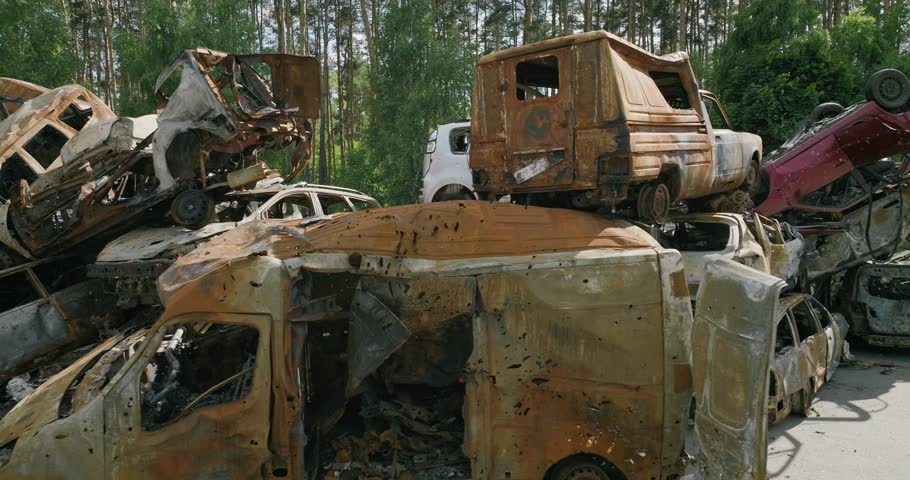UKRAINE - aerial of wrecked and burned cars in the car cemetery
