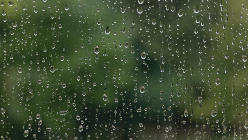 Raindrops On Glass Window. Rainy Day.
