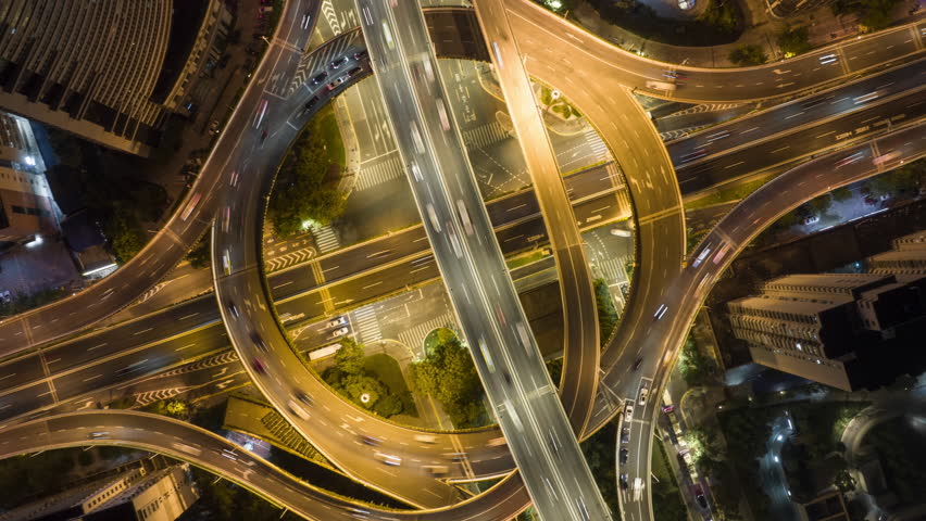 Aerial hyperlapse footage of Shanghai Luban Road interchange busy traffic night scene. | Shutterstock HD Video #1100955217