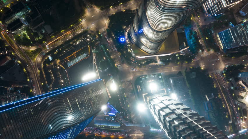 Aerial view of the skyscrapers and busy traffic in Lujiazui, Shanghai at night