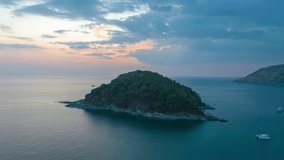
aerial hyperlapse view sunset at Laem Promthep Cape.
Promthep cape viewpoint is the most popular viewpoint in Phuket island.
time lapse day to night 4K video of Majestic sunset landscape.