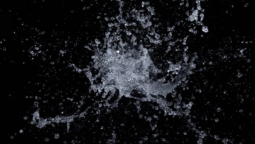 Super Slow Motion Shot of Real Water Splash Explosion from Surface Isolated on Black at 1000fps. Royalty-Free Stock Footage #1100957253
