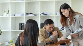 Asian entrepreneurs and business people meeting in a conference room in business planning, financial budget and investment risk assessment to analyze customer groups to increase company growth. - Powered by Shutterstock - Get 15% off with code: PIKWIZARD15