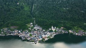 Aerial view of Hallstatt village, mountains background in Austria Stock drone video