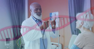 Animation of dna strand over african american male doctor with female patient. Global medicine, healthcare, digital interface, computing and data processing concept digitally generated video.
