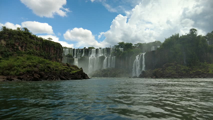 Breathtaking views of Iguazu falls from a boat at Iguazu fall Argentina Royalty-Free Stock Footage #1100973987