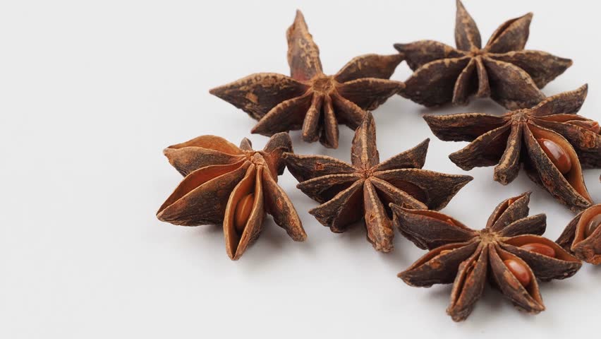 Star anise or chinese badiane spice or Illicium verum Royalty-Free Stock Footage #1100984109