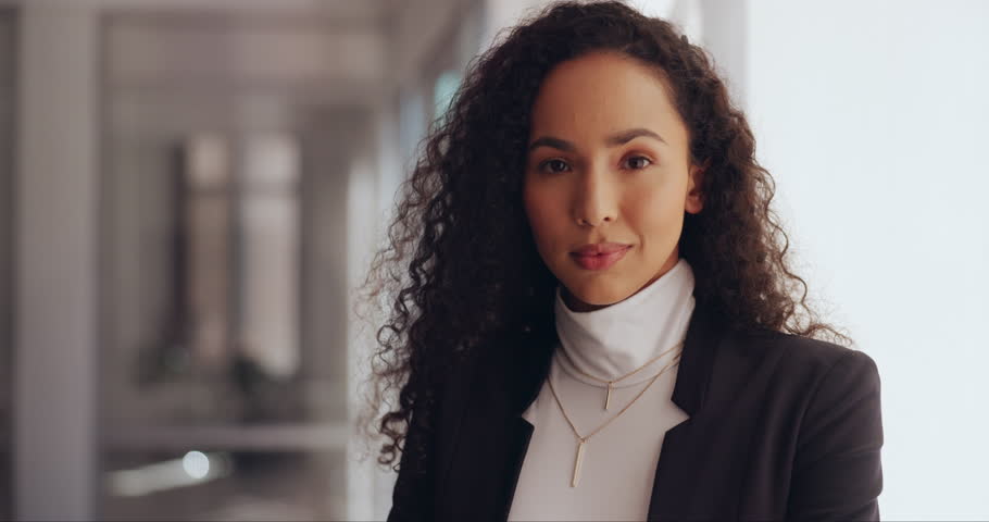 Face, vision and mission with a business black woman in her office with a positive mindset of future growth. Serious portrait with a female employee ready for development in the USA | Shutterstock HD Video #1100989201