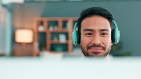 Business man having a vrtual interview, greeting the recruiter..Confident, smiling guy in front of computer working remote on a call. Happy male in headphones having a meeting from home.